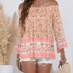 Audrey - Elegante blusa con estampato floreale e spalle scoperte