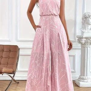 Akira - Elegante Tuta a Gamba Larga con Collo Halter e Stampa Astratta